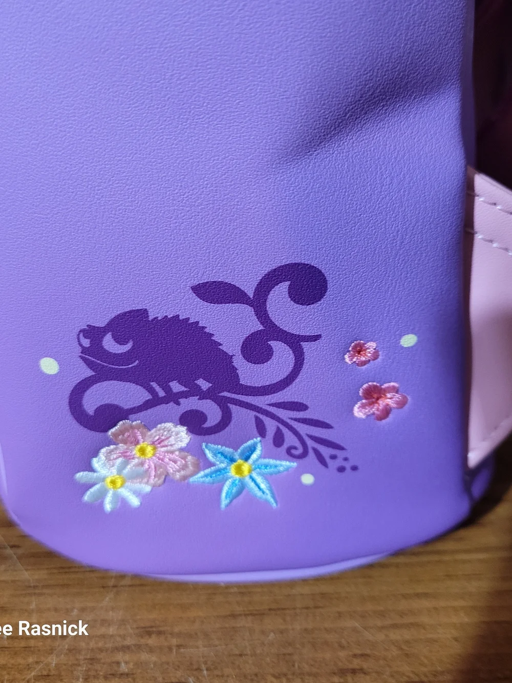 Loungefly Tangled Rapunzel Exclusive Floral Flap Mini Backpack with Coin Bag.